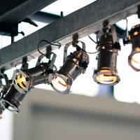 Modern industrial spotlights mounted on a ceiling providing focused illumination.